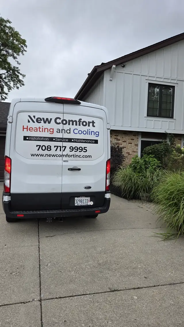 New Comfort service van parked in a customer's driveway