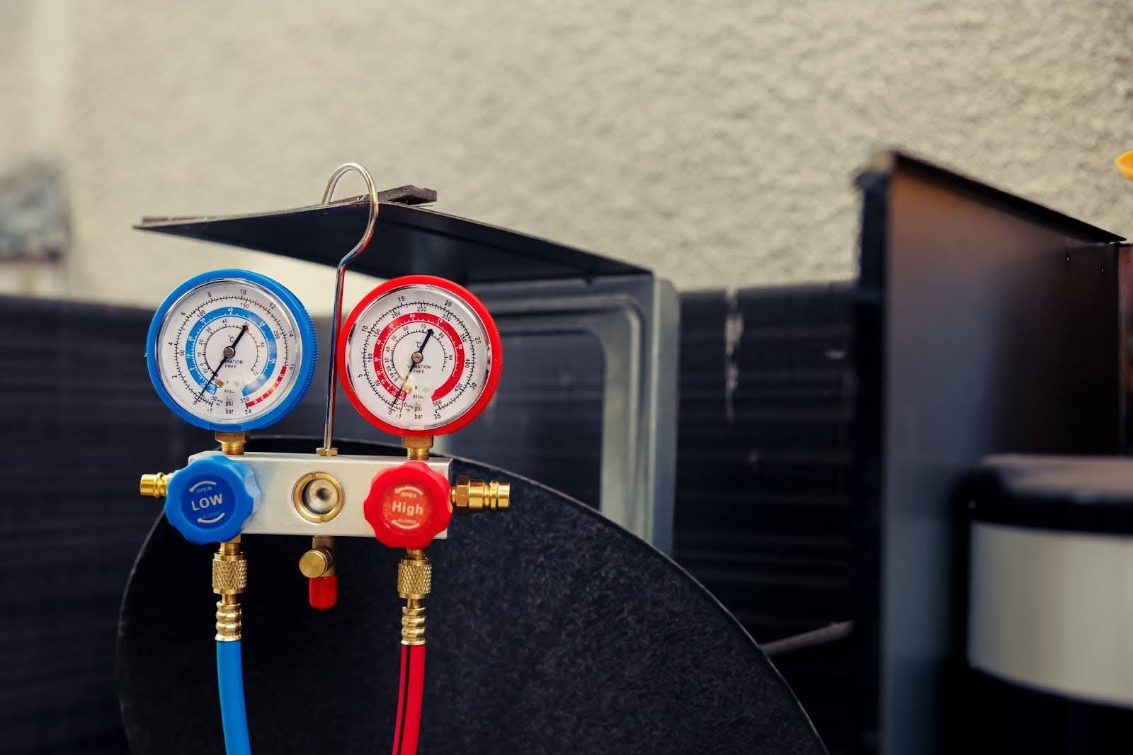 Refrigerant manifold gauges used for air conditioning repair diagnostics