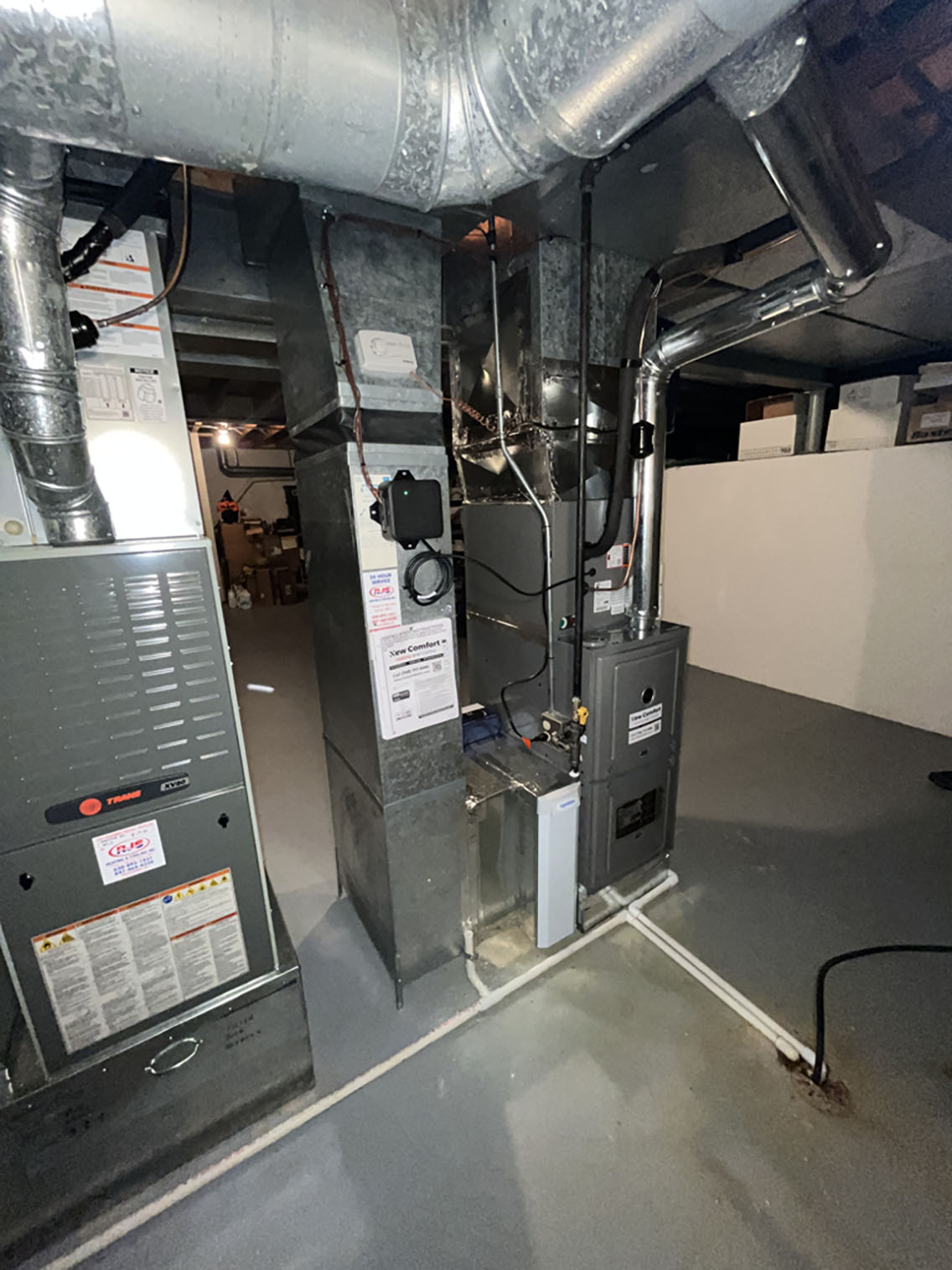 New high-efficiency furnace and sealed ductwork in a finished basement - furnace repair and replacement for Homer Glen homes