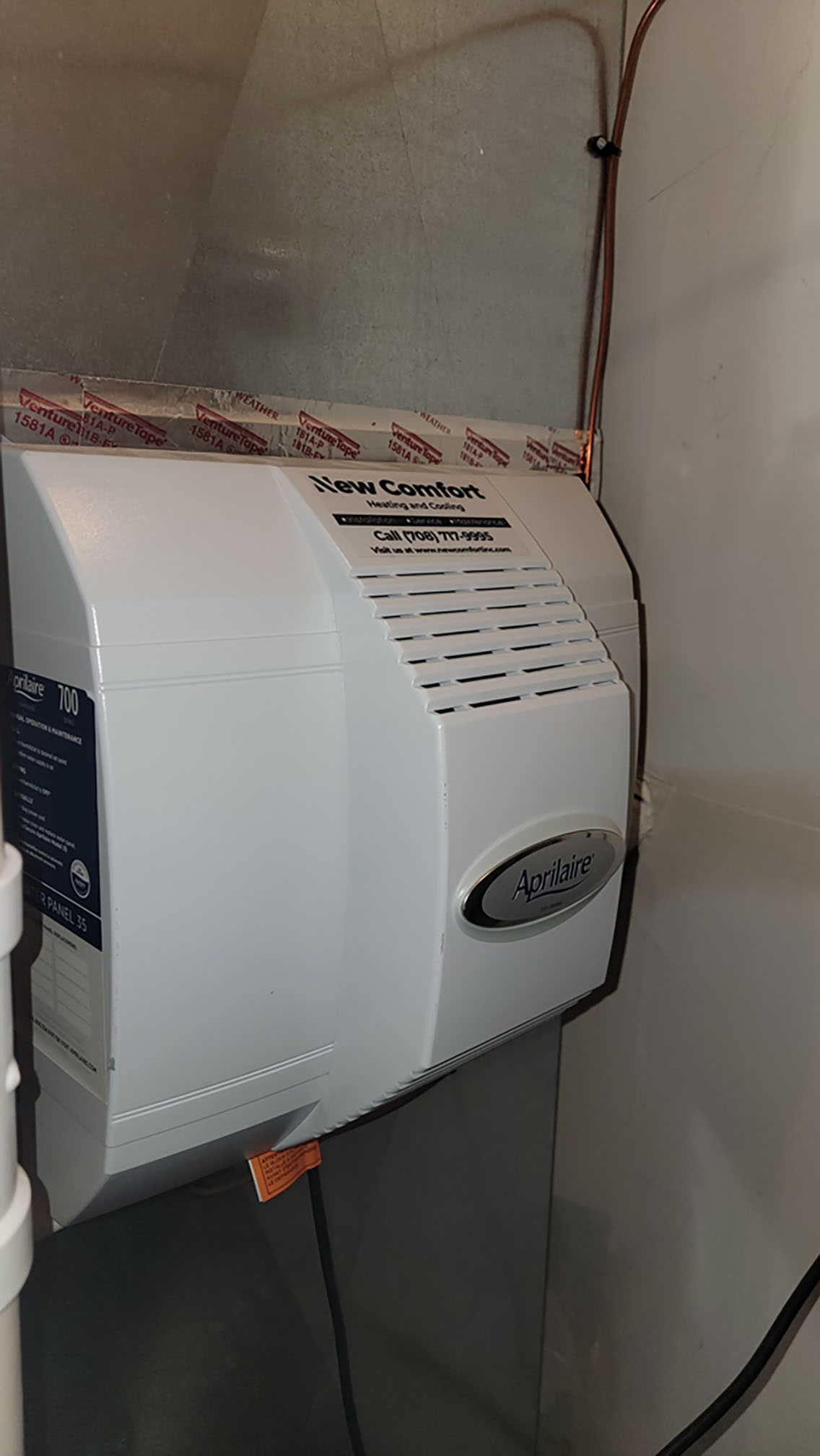Whole-house bypass humidifier mounted on a furnace plenum after a humidifier tune-up